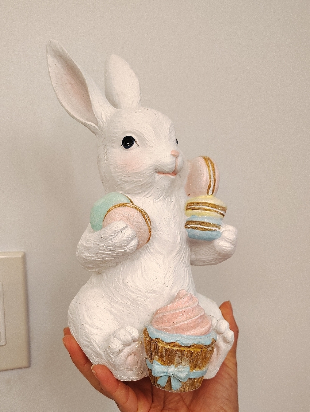 White Ceramic Bunny Figurine with Pastel Macarons and Cupcake
